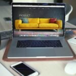 Laptop on desk with website on it